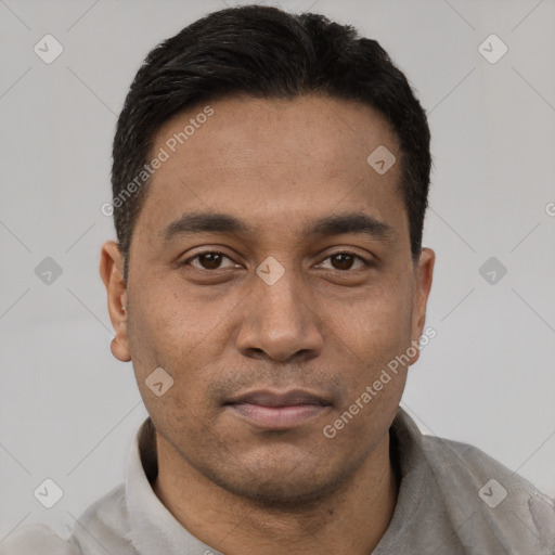 Neutral latino young-adult male with short  black hair and brown eyes