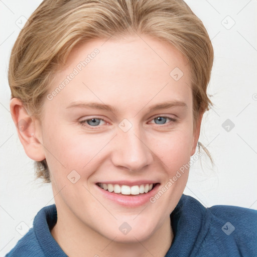 Joyful white young-adult female with medium  brown hair and blue eyes