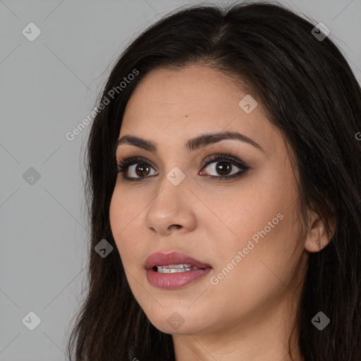 Joyful white young-adult female with long  brown hair and brown eyes