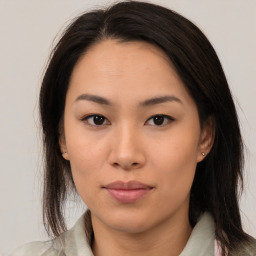 Neutral asian young-adult female with medium  brown hair and brown eyes