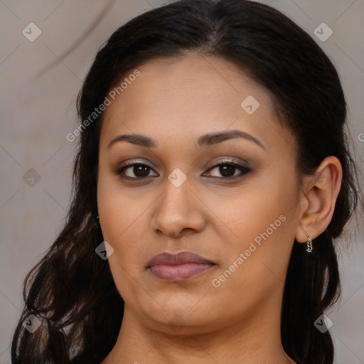 Joyful latino young-adult female with long  brown hair and brown eyes