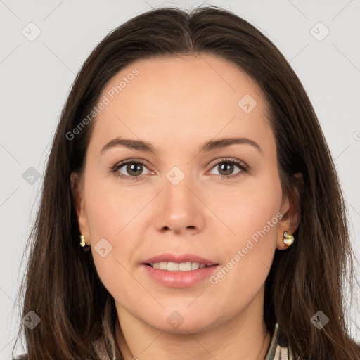 Joyful white young-adult female with long  brown hair and brown eyes