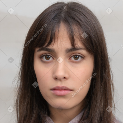 Neutral white young-adult female with long  brown hair and brown eyes