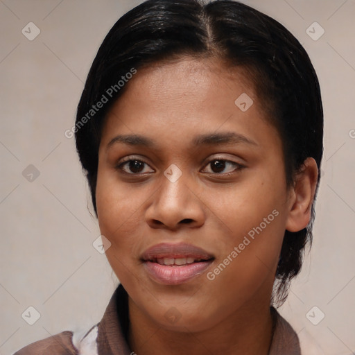 Joyful black young-adult female with medium  black hair and brown eyes