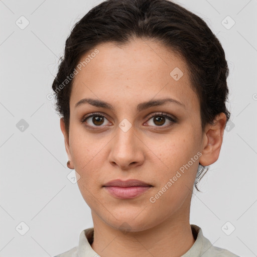 Neutral white young-adult female with short  brown hair and brown eyes