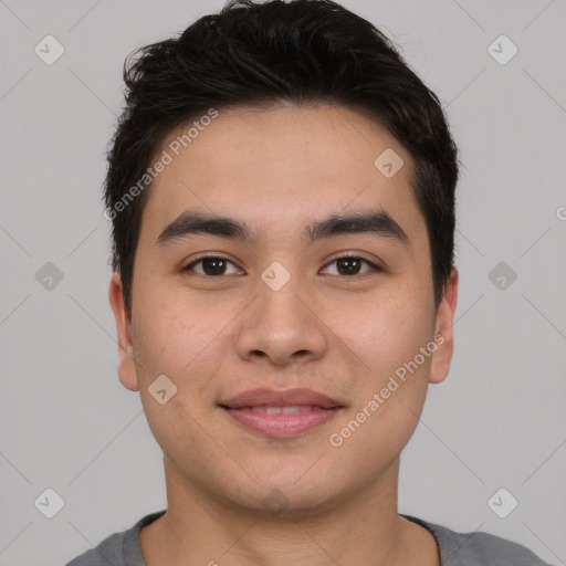 Joyful asian young-adult male with short  brown hair and brown eyes