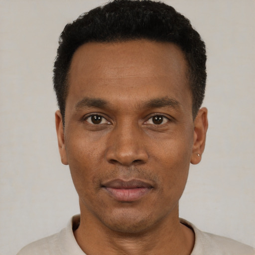 Neutral black young-adult male with short  black hair and brown eyes
