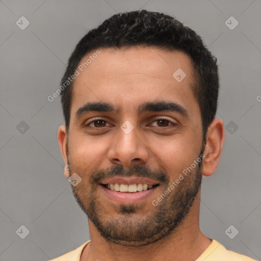 Joyful white young-adult male with short  black hair and brown eyes