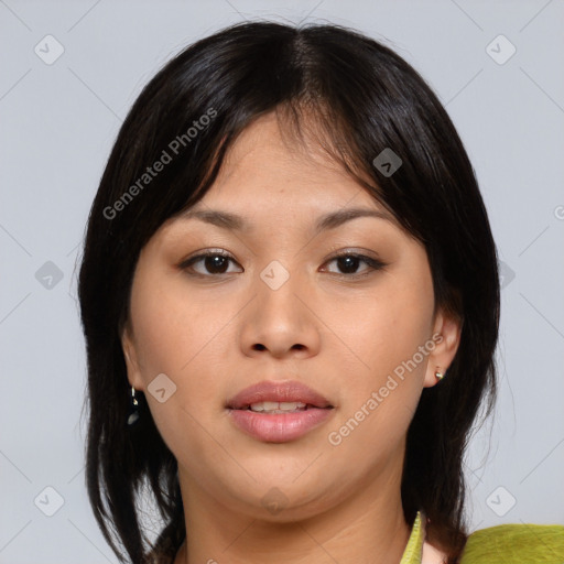 Joyful asian young-adult female with medium  brown hair and brown eyes