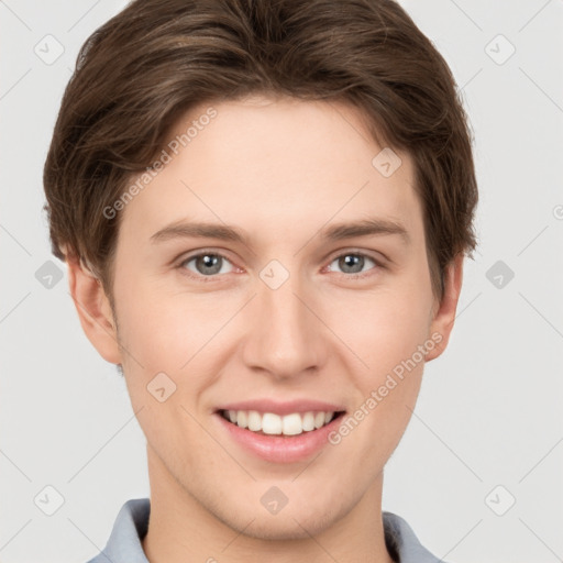 Joyful white young-adult female with short  brown hair and grey eyes