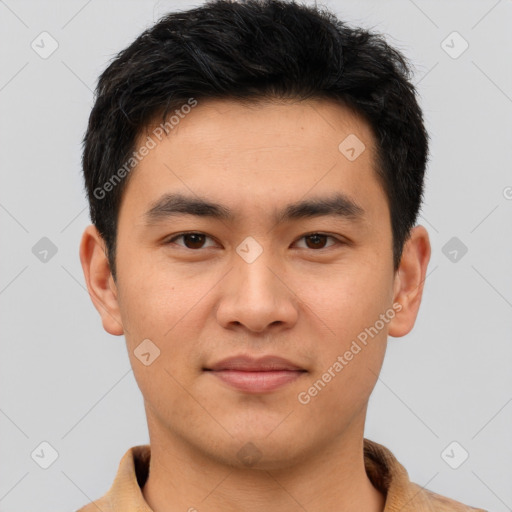 Joyful white young-adult male with short  black hair and brown eyes