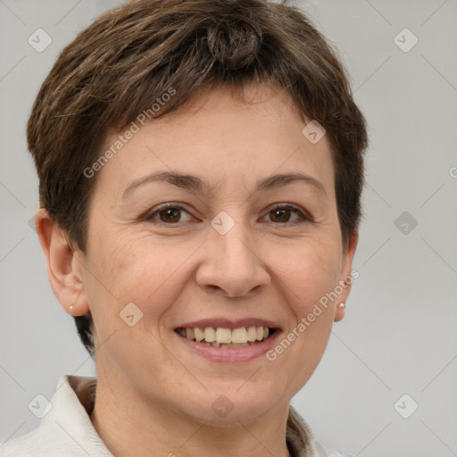 Joyful white adult female with short  brown hair and brown eyes