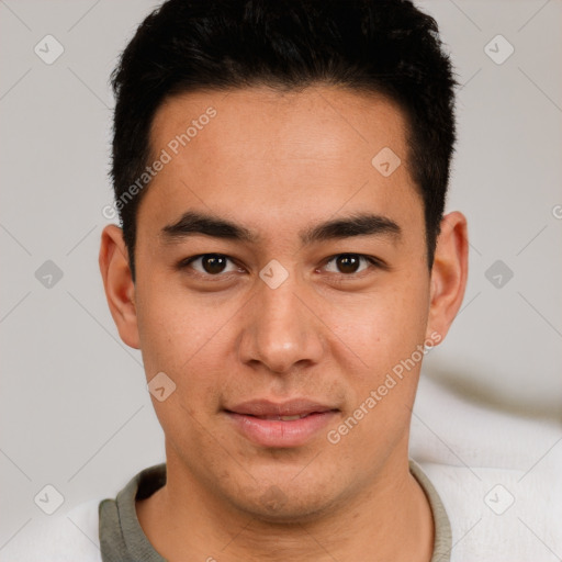 Joyful latino young-adult male with short  brown hair and brown eyes