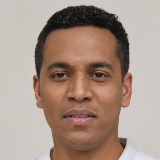 Neutral black young-adult male with short  black hair and brown eyes