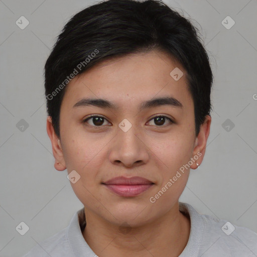 Joyful asian young-adult female with short  black hair and brown eyes