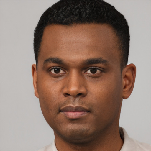 Neutral black young-adult male with short  black hair and brown eyes