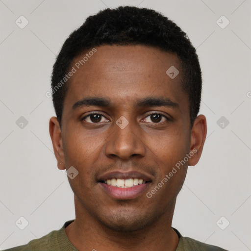 Joyful black young-adult male with short  black hair and brown eyes