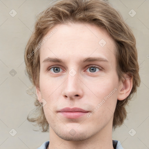 Neutral white young-adult female with medium  brown hair and grey eyes