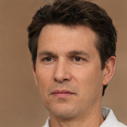 Neutral white adult male with short  brown hair and brown eyes