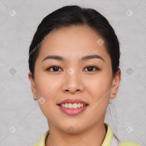 Joyful asian young-adult female with short  brown hair and brown eyes