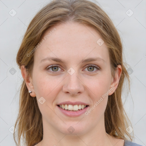 Joyful white young-adult female with medium  brown hair and blue eyes