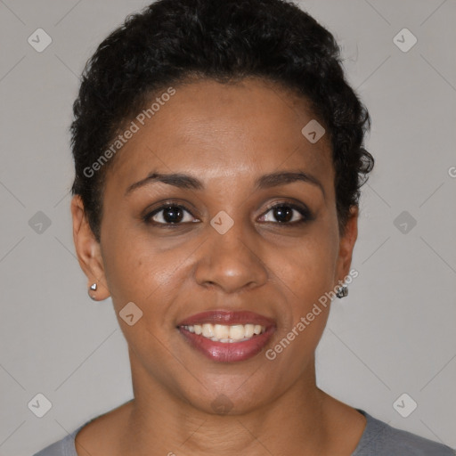 Joyful black young-adult female with short  brown hair and brown eyes