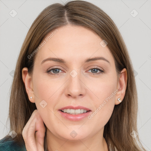 Joyful white young-adult female with long  brown hair and grey eyes