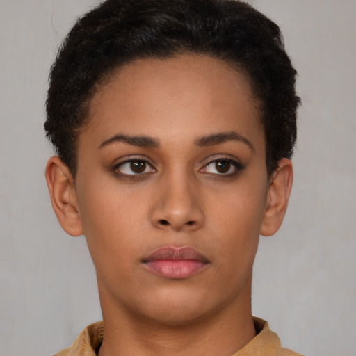 Neutral latino young-adult female with short  brown hair and brown eyes