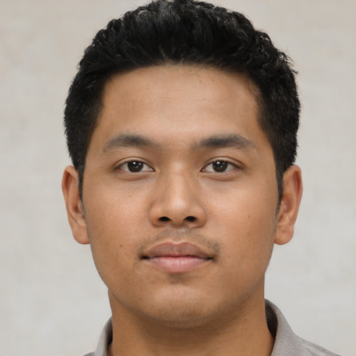 Neutral asian young-adult male with short  black hair and brown eyes