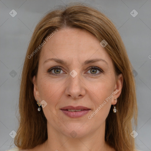 Joyful white adult female with medium  brown hair and grey eyes