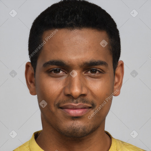 Joyful black young-adult male with short  black hair and brown eyes