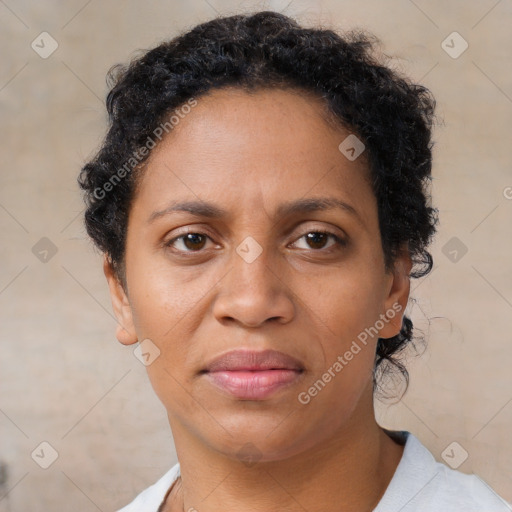 Neutral black adult female with short  brown hair and brown eyes