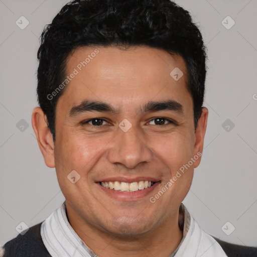 Joyful white young-adult male with short  black hair and brown eyes