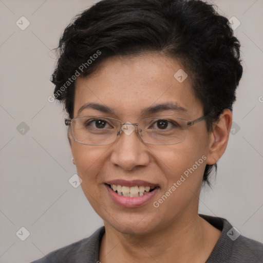 Joyful white adult female with short  brown hair and brown eyes