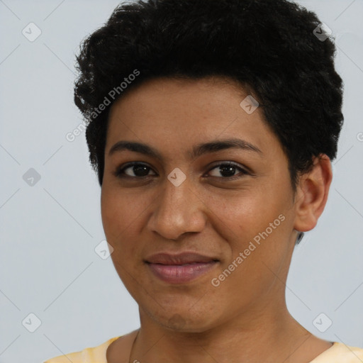 Joyful latino young-adult female with short  black hair and brown eyes