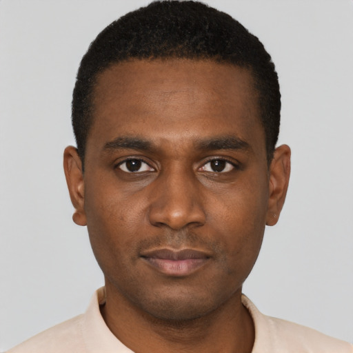 Neutral black young-adult male with short  black hair and brown eyes