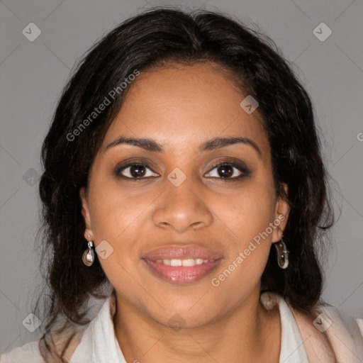 Joyful black young-adult female with medium  brown hair and brown eyes