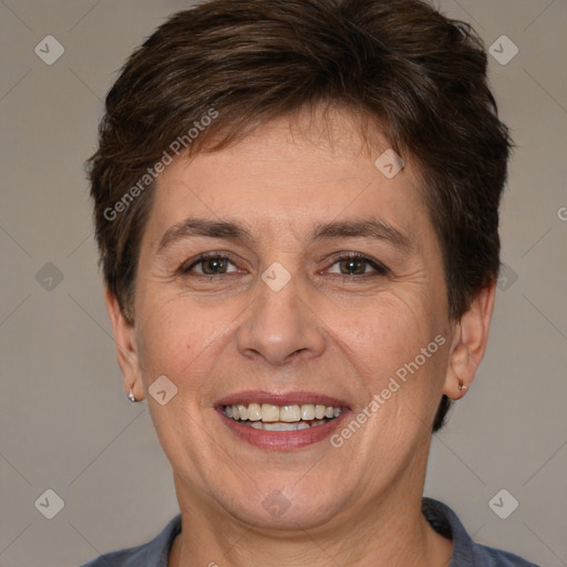 Joyful white adult female with short  brown hair and brown eyes