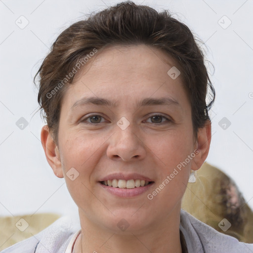 Joyful white young-adult female with short  brown hair and brown eyes