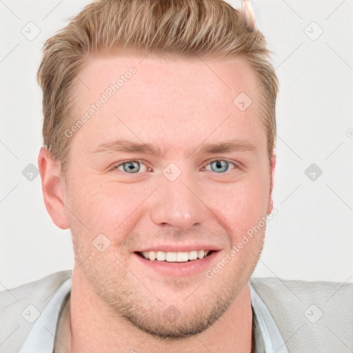 Joyful white young-adult male with short  brown hair and blue eyes