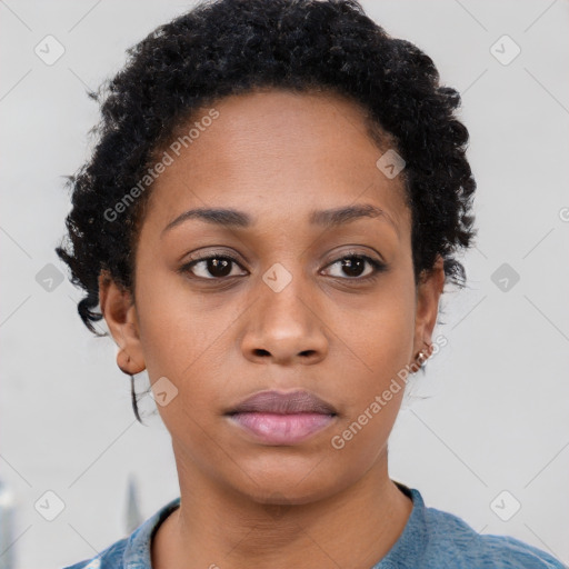 Neutral black young-adult female with short  black hair and brown eyes