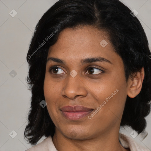 Joyful latino young-adult female with medium  black hair and brown eyes