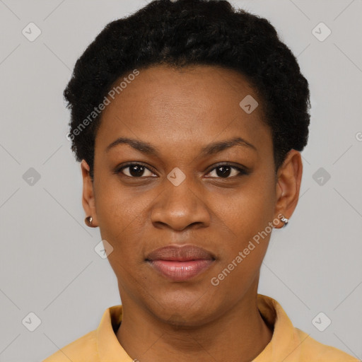 Joyful black young-adult female with short  black hair and brown eyes