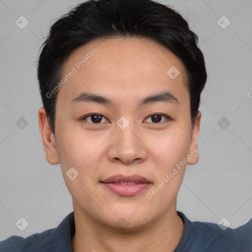 Joyful asian young-adult male with short  brown hair and brown eyes