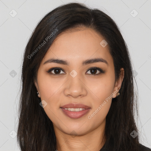 Joyful latino young-adult female with long  brown hair and brown eyes