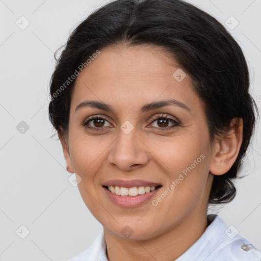 Joyful latino young-adult female with medium  brown hair and brown eyes