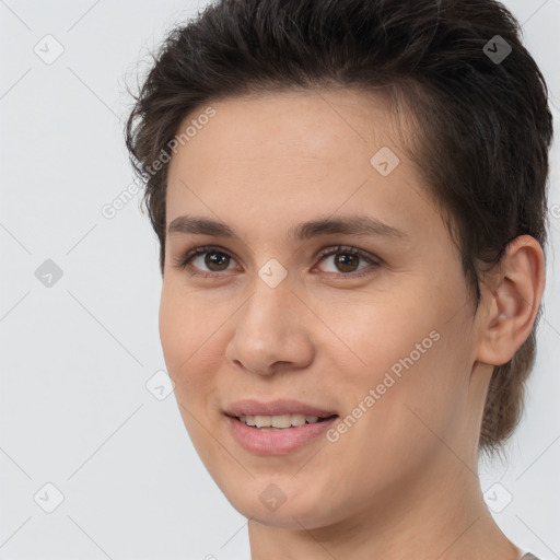 Joyful white young-adult female with short  brown hair and brown eyes