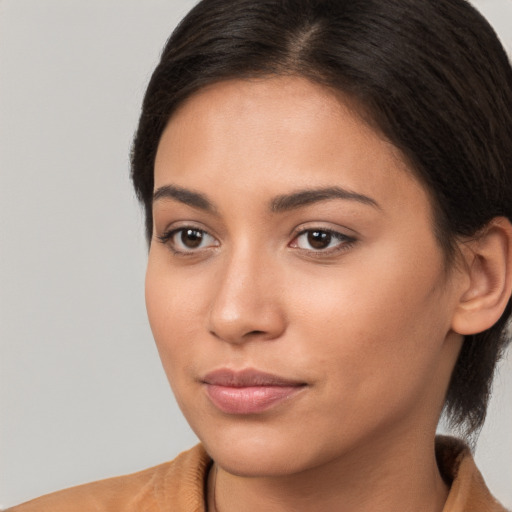 Neutral white young-adult female with medium  brown hair and brown eyes