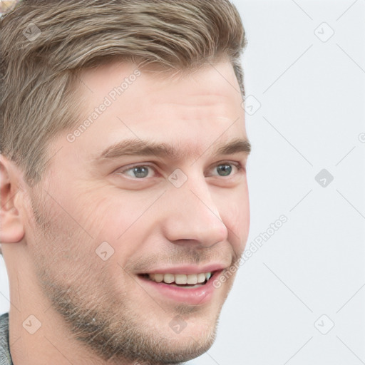 Joyful white young-adult male with short  brown hair and blue eyes