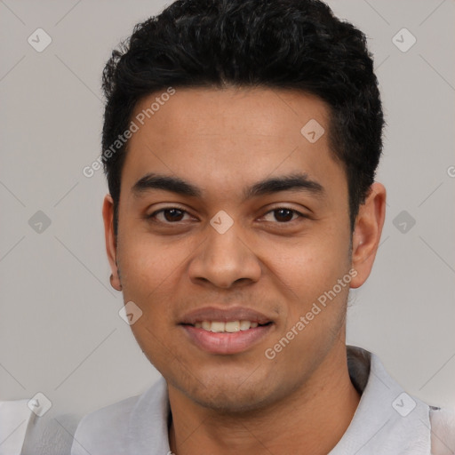 Joyful latino young-adult male with short  black hair and brown eyes